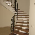 Кованное ограждение для лестницы винтовой