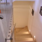 Нестандартное ограждение из нержавеющей стали для лестницы